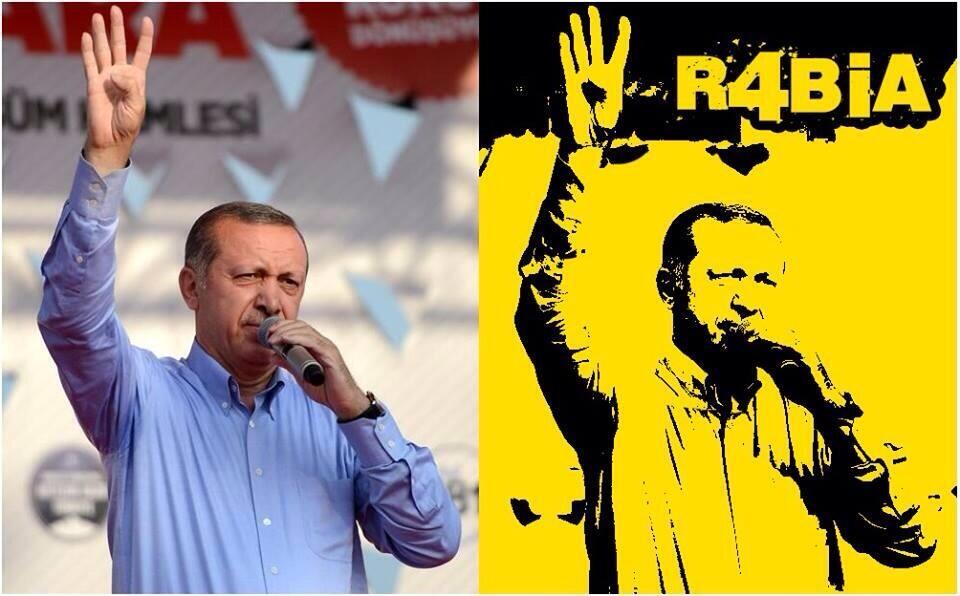 De Turkse premier Recep Tayyip Erdogan maakt het R4BIA-teken